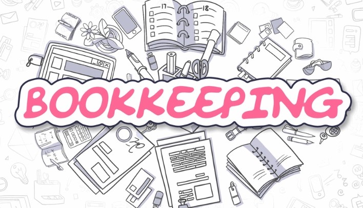 Bookkeeping side hustle. Bookkeeping written in pink with books, pens, pads, and other stuff in the background. 